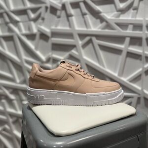 Nike Women's Sneakers in Beige and White